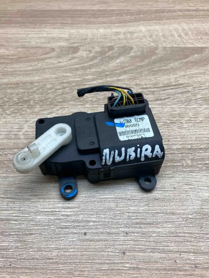 Daewoo Nubira (1995 - 2005) 06A25A1 Двигатель задвижки потока воздуха — фото 1