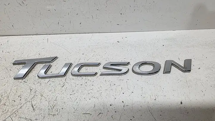 Hyundai Tucson TL (2015 - ) 86310D3000 Эмблема модели — фото 1