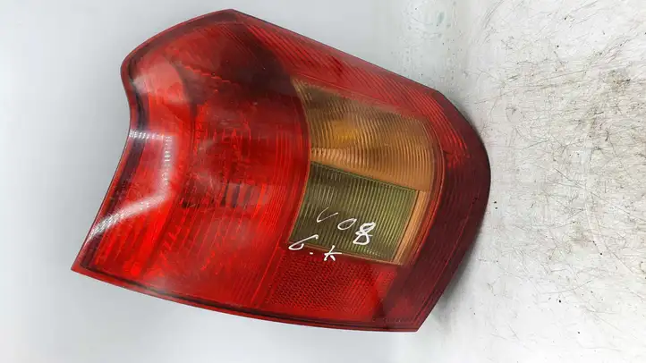 Toyota Corolla E120 E130 (2000 - 2004) E1100F2081 Задний фонарь в кузове — фото 1