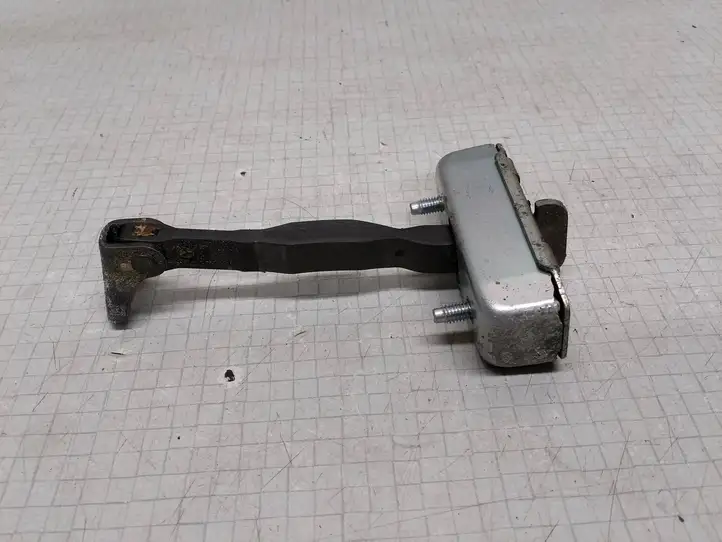 Toyota Corolla E120 E130 (2004 - 2007) Ограничитель двери — фото 2
