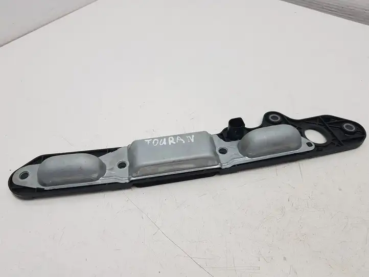 Volkswagen Touran I (2003 - 2010) 1T0827574L Подсветка номера — фото 2
