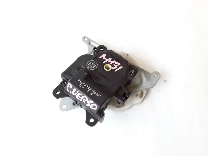 Toyota Corolla Verso E121 (2004 - 2007) AE0637008610 Двигатель задвижки потока воздуха — фото 1