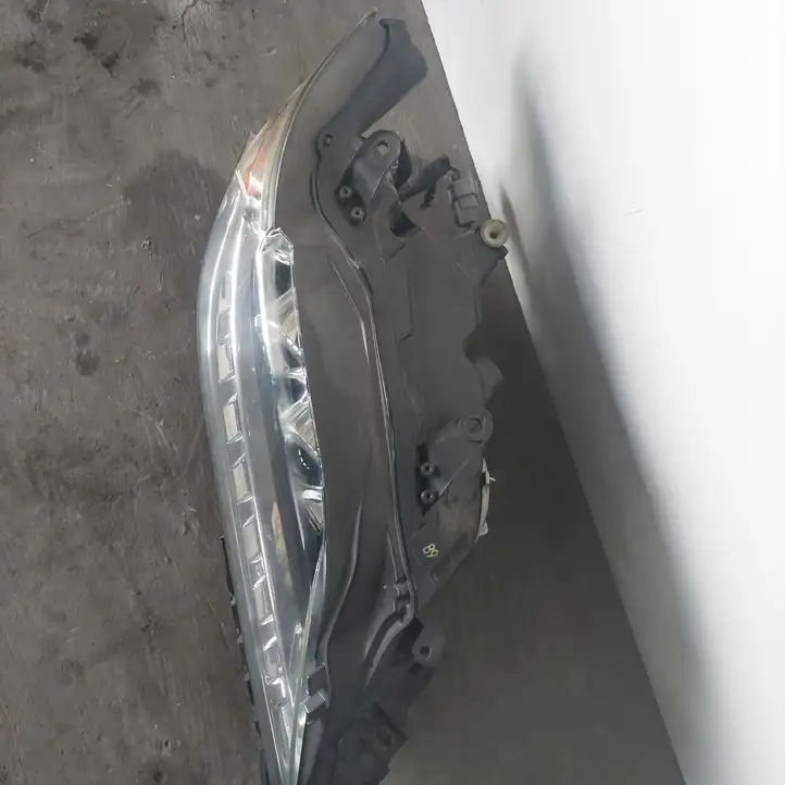 Lexus RX 450H (2012 - 2015) Передняя фара — фото 2