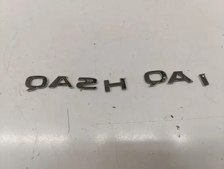 Nissan Qashqai J12 (2021 - ) Эмблема модели — фото 2