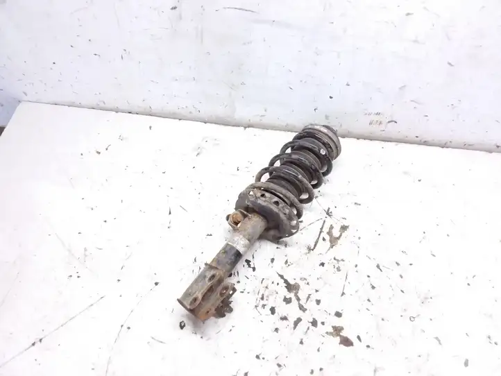 Opel Astra (2004 - 2009)   Передний амортизатор с пружиной