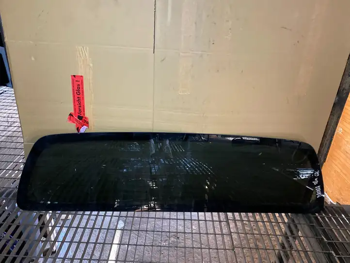 Nissan Navara D40 (2004 - 2015) Заднее стекло — фото 1
