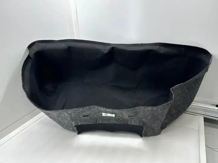Tesla Model X (2015 - 2021) 104805900E Обшивка бардачка — фото 1