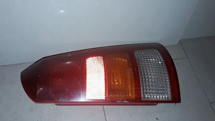 Ford Focus (1998 - 2004) XS4X13N004EC Задний фонарь в кузове — фото 1