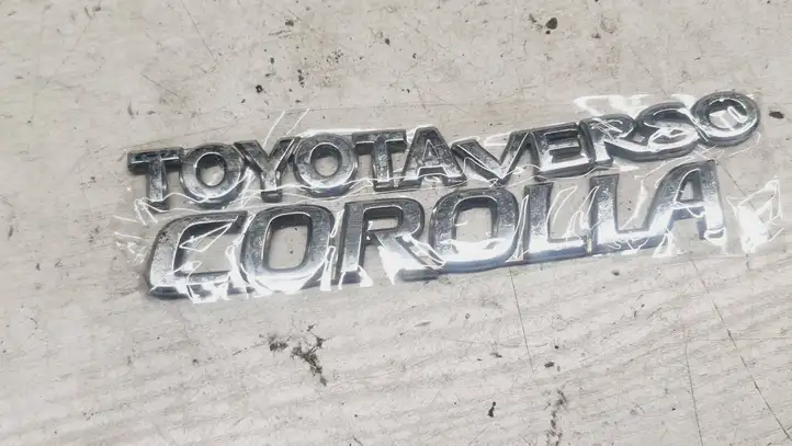 Toyota Corolla Verso AR10 (2004 - 2009) Эмблема производителя — фото 2