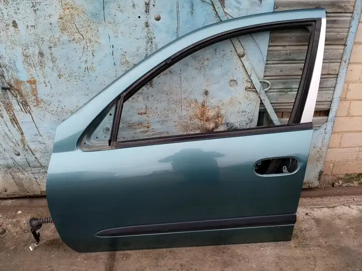 Nissan Almera N16 (2000 - 2010) Дверь — фото 1