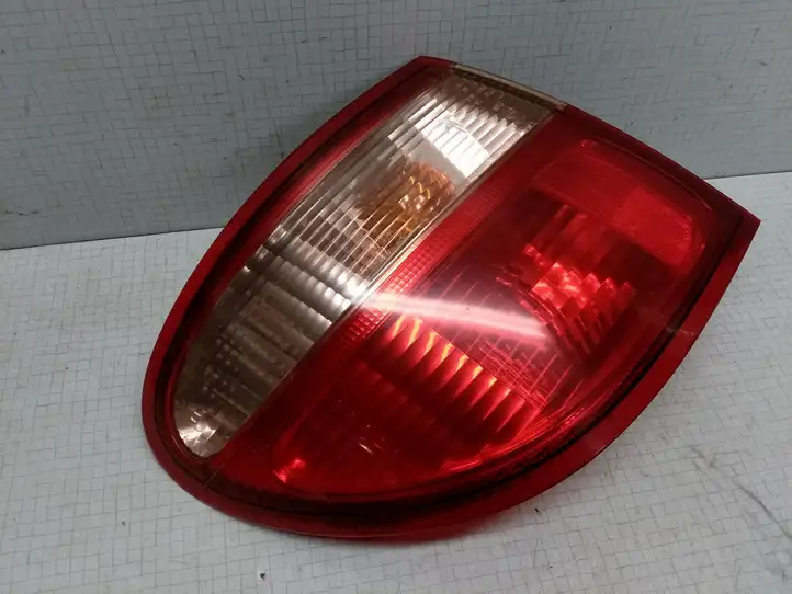 Nissan Almera N16 (2000 - 2010) ICHIKOH4880A Задний фонарь в кузове — фото 1