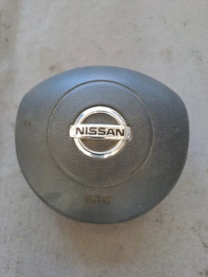 Nissan Micra (2003 - 2007) Подушка безопасности руля — фото 1