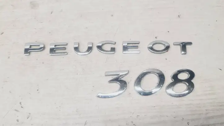Peugeot 308 (2007 - 2013) Эмблема производителя — фото 1