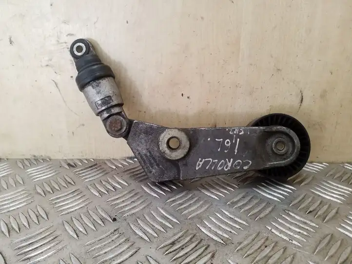 Toyota Corolla E120 E130 (2004 - 2007) F2262395 Натяжитель ремня ГРМ — фото 2