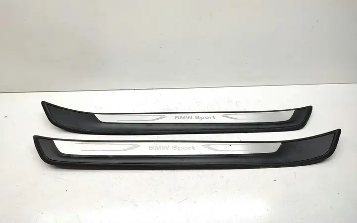 BMW X1 E84 (2009 - 2015) 7318566 Внутренняя обшивка порога (комплект) — фото 1