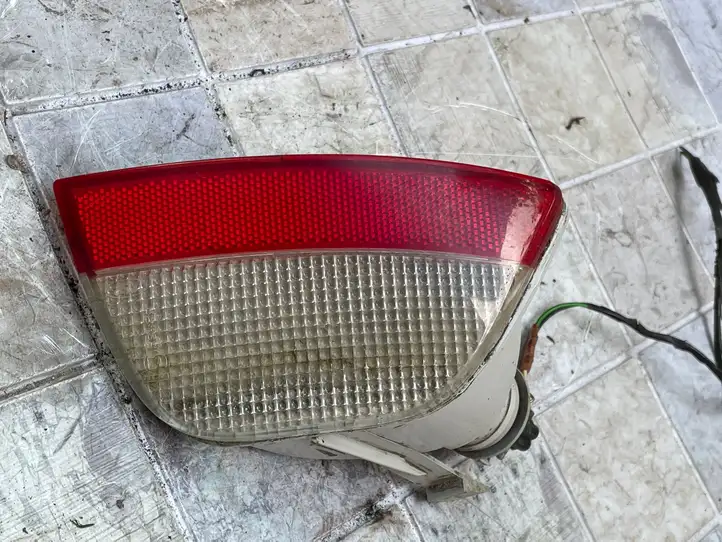 Ford Focus (2005 - 2008) XS4115K272A Задняя противотуманная фара — фото 1