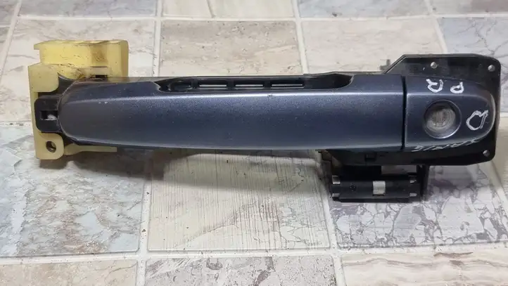 Toyota Yaris (2005 - 2009) Наружная ручка двери — фото 2