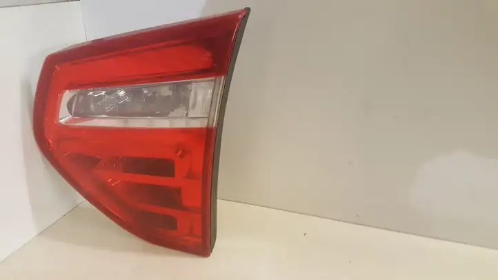 Citroen C4 (2008 - 2011) Задний фонарь в крышке багажника — фото 1