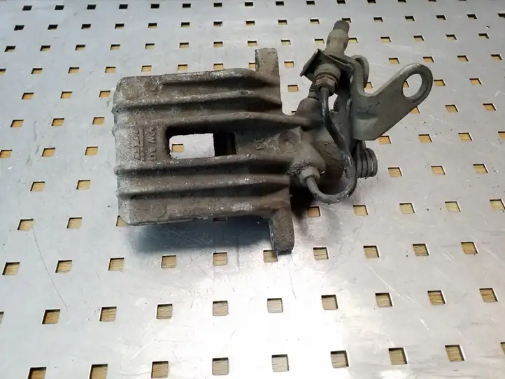 Seat Altea XL (2004 - 2015) Тормозной суппорт задний — фото 1
