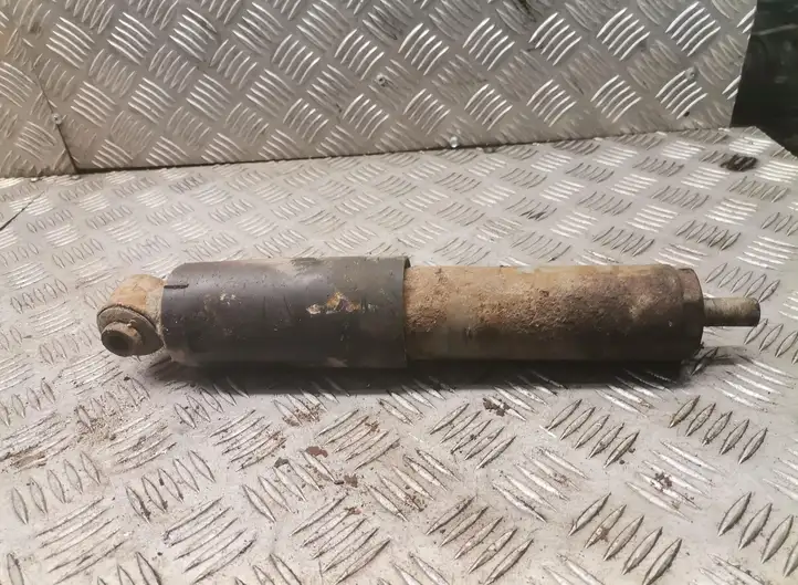 Volkswagen Transporter-Caravelle (1990 - 2003)   Задний амортизатор с пружиной