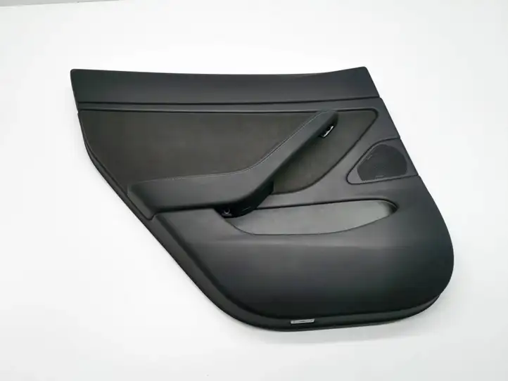 Tesla Model 3 (2017 - 2023) 1090413-01-L Обшивка задней двери — фото 1