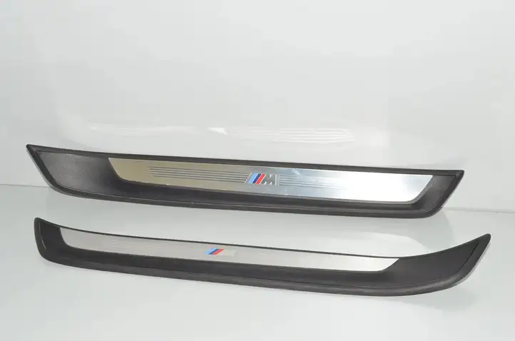 BMW X1 E84 (2009 - 2015) Внутренняя отделка переднего порога — фото 1