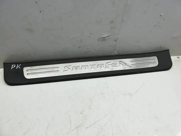 Hyundai Santa Fe (2005 - 2009) 858712B000 Внутренняя отделка переднего порога — фото 1