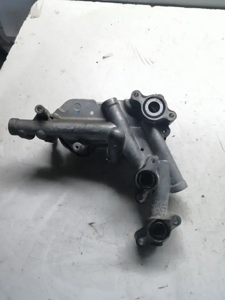 Toyota Corolla Verso AR10 (2004 - 2009) 157100R01000 Кронштейн масляного фильтра — фото 2