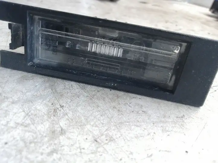 Opel Astra J (2009 - 2012) 13251936 Подсветка номера — фото 3