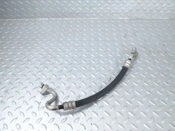 Nissan Micra (2010 - 2013) QA1024757 Трубки и шланги кондиционера — фото 1