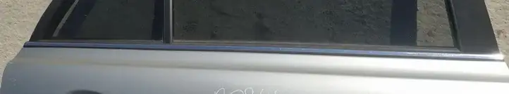 Toyota Avensis T250 (2006 - 2009) Накладка стекла задней двери — фото 1