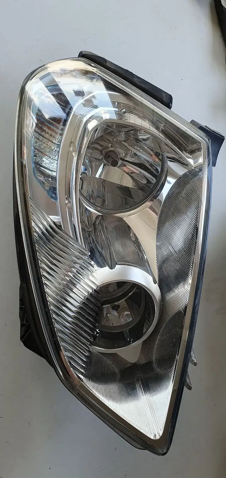 Nissan Qashqai (2006 - 2010) Передняя фара — фото 1