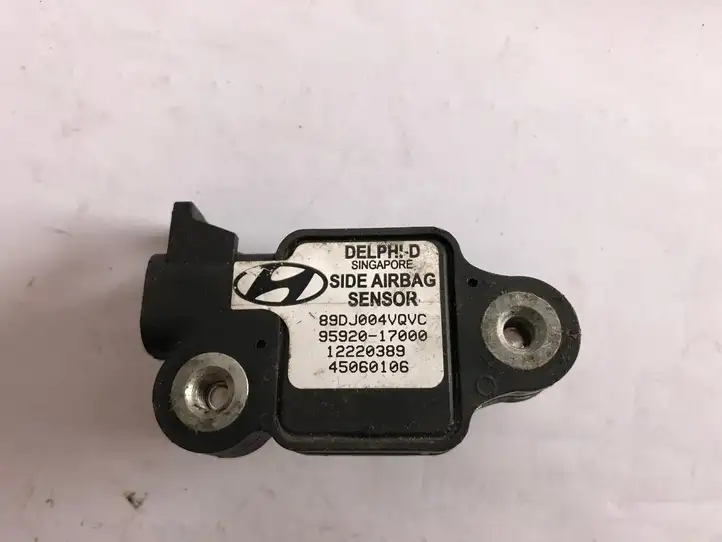Hyundai Matrix (2005 - 2008) 89DJ004VQVC Датчик удара SRS — фото 1