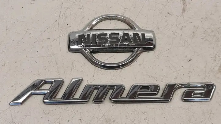 Nissan Almera N16 (2000 - 2010) 848900N000 Эмблема производителя — фото 1