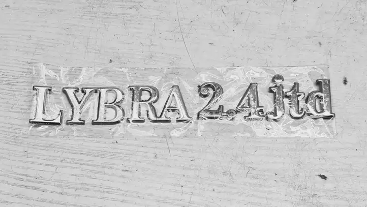 Lancia Lybra (1999 - 2006) Эмблема производителя — фото 3