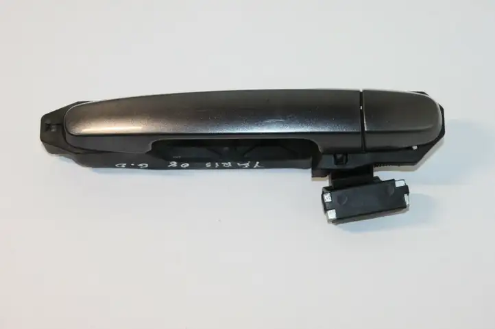 Toyota Yaris (2005 - 2009) Наружная ручка задней двери — фото 1