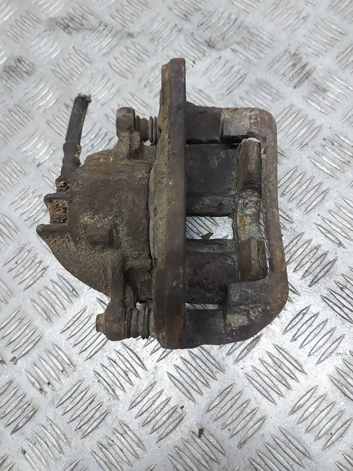 Volvo S40, V40 (2000 - 2004) Тормозной суппорт передний — фото 5