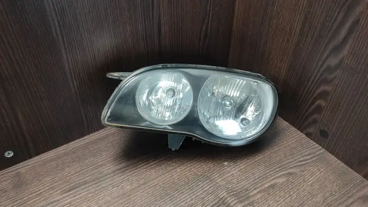 Toyota Corolla E110 (1995 - 2002) 10077126 Передняя фара — фото 1