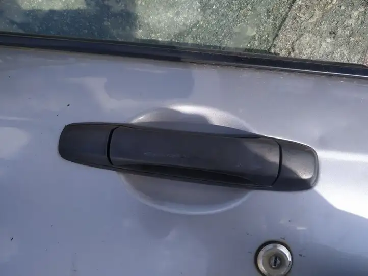 Subaru Forester SG (2006 - 2008) Наружная ручка двери — фото 1