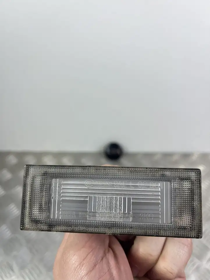 Kia Sorento (2014 - 2017) Подсветка номера — фото 4