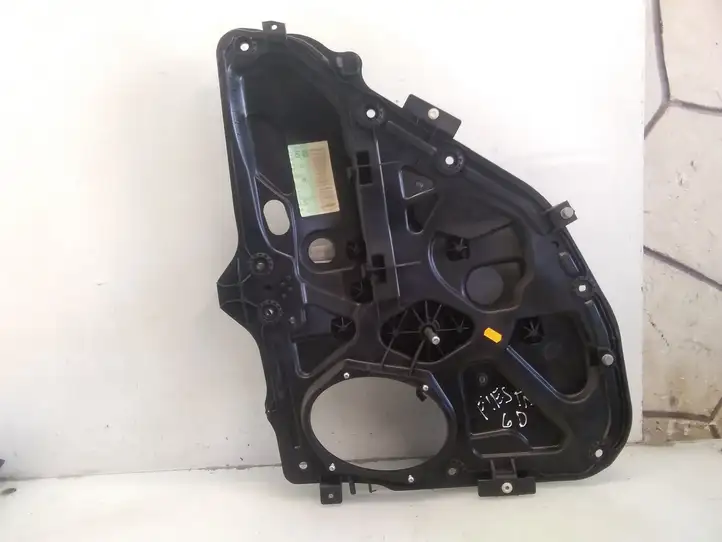 Ford Fiesta (2006 - 2008) Механический стеклоподъемник задней двери — фото 1