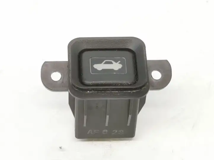 Honda CR-V (2006 - 2009) M08525 Кнопка закрытия крышки багажника — фото 1