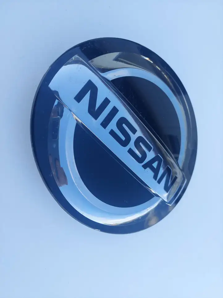 Nissan Qashqai (2017 - 2020) 628896CA0A Эмблема автомобиля — фото 1