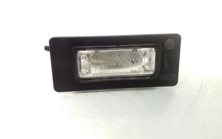 Volkswagen PASSAT B6 (2005 - 2010) 8T0943021 Подсветка номера — фото 1