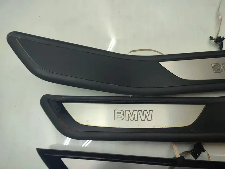 BMW 7 F01 (2008 - 2016) 7181012 Внутренняя обшивка порога (комплект) — фото 2