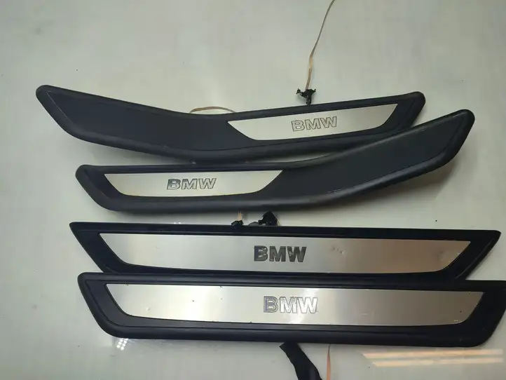 BMW 7 F01 (2008 - 2016) 7181012 Внутренняя обшивка порога (комплект) — фото 11