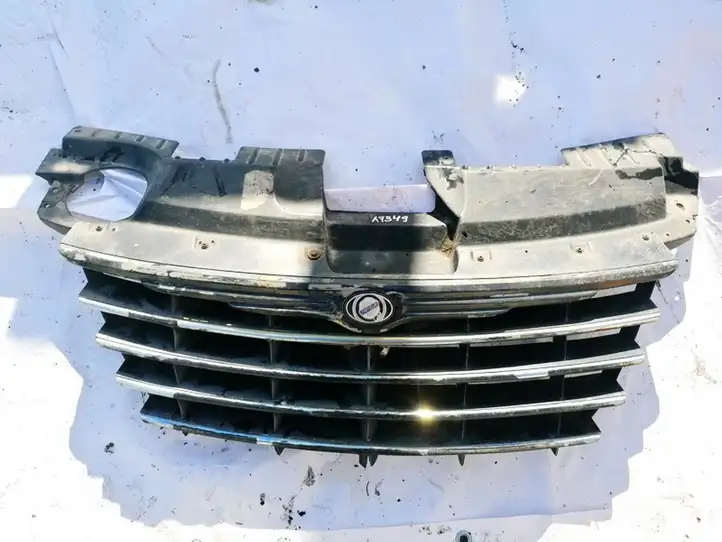 Chrysler Town & Country IV (2000 - 2007) 04857410AB Передняя решетка — фото 1