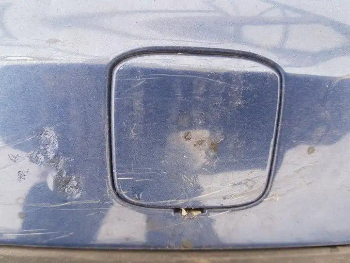 Ford Focus (2005 - 2008) Заглушка буксировочной петли бампера — фото 1