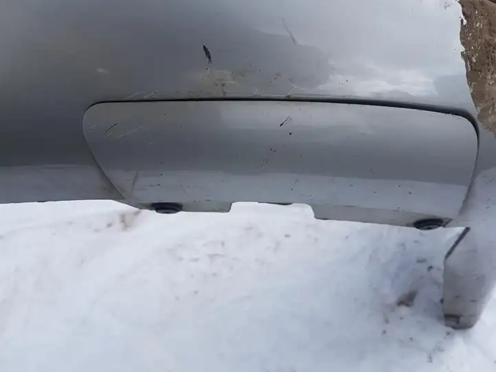 Chevrolet Epica (2006 - 2009) Заглушка буксировочной петли бампера — фото 1