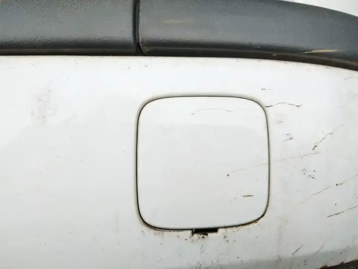 Ford Focus (2005 - 2008) Заглушка буксировочной петли бампера — фото 1